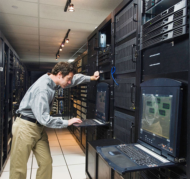 Image of IT worker and servers
