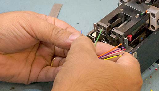 A worker splicing cable